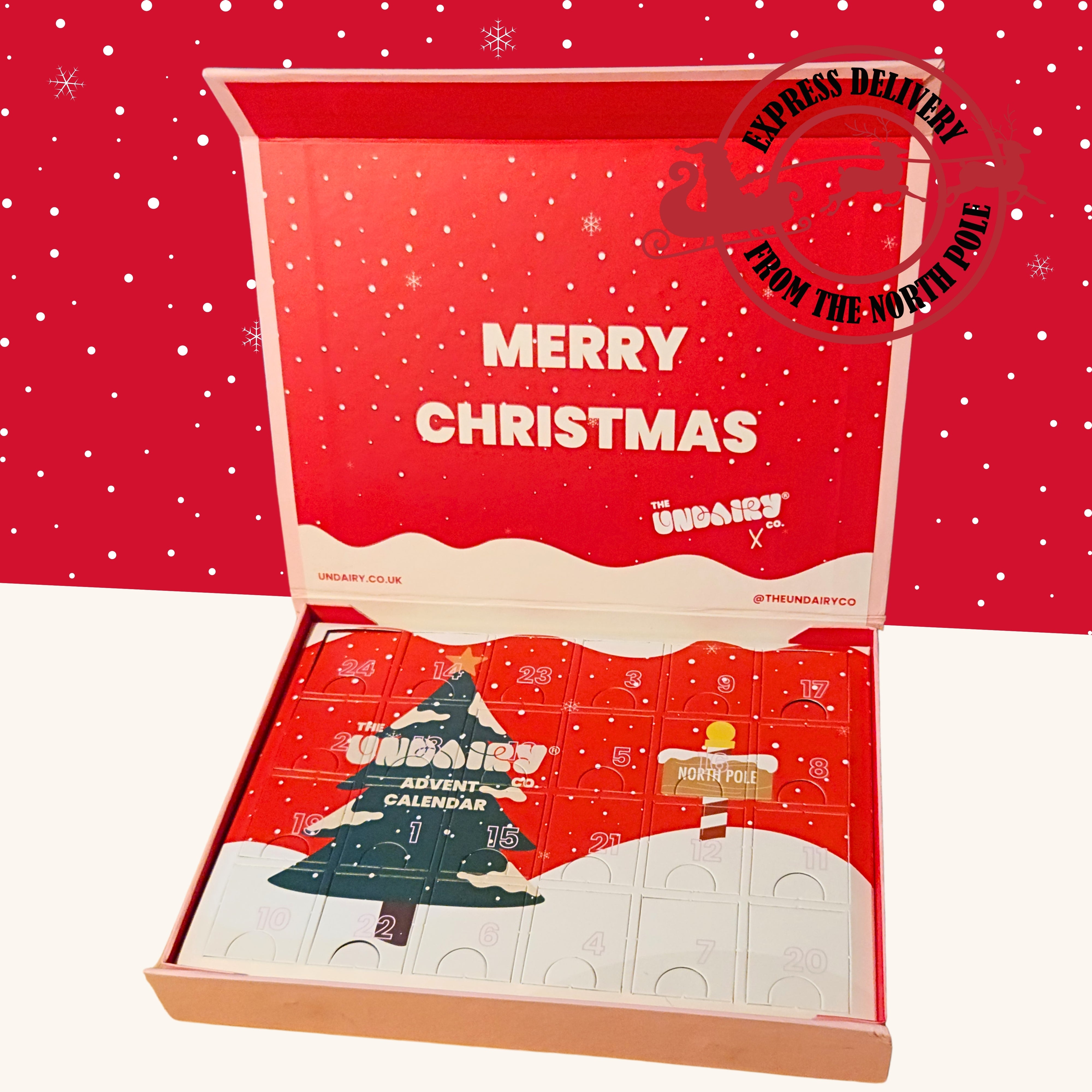 Unboxed Christmas advent calendar with 'Merry Christmas' text on a red background